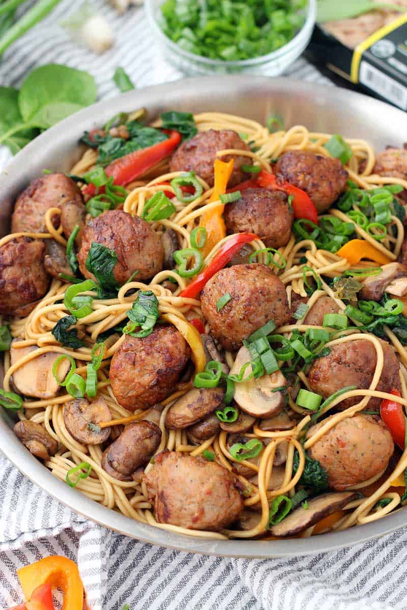 A skillet of teriyaki chicken meatball lo mein.