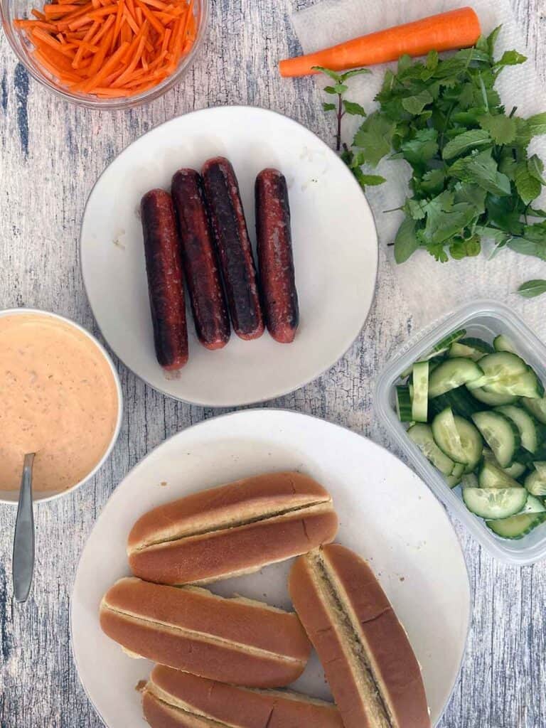 All the ingredients needed to make Bánh Mì hot dogs.