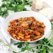 With a few tricks and only five ingredients, you can make the BEST Pasta with Bolognese sauce at home- the kind where the sauce clings to every piece of pasta and has the most authentic Italian taste!