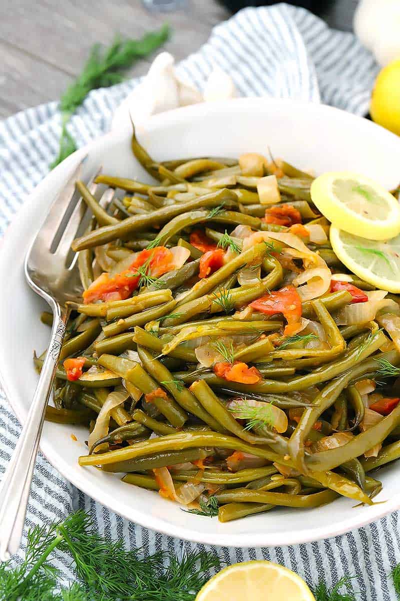 Close up photo of Greek Green beans in a bowl.