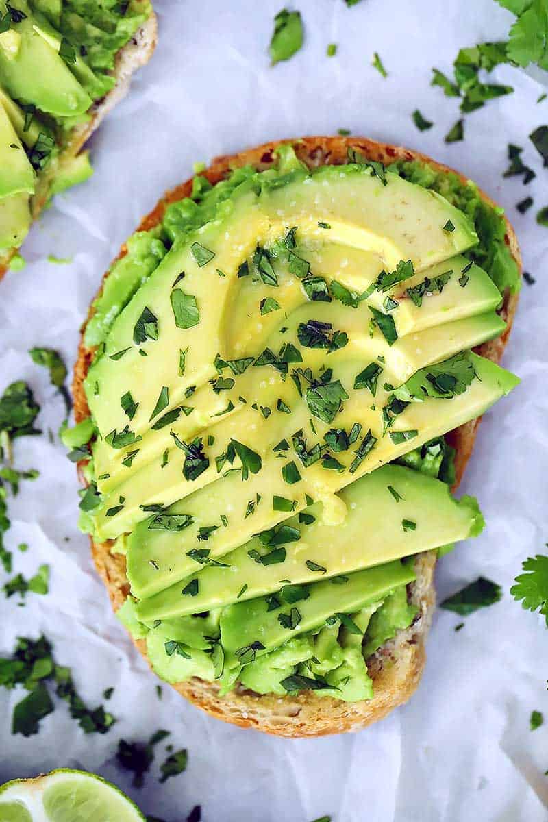 Close up overhead photo of a slice of avocado toast.