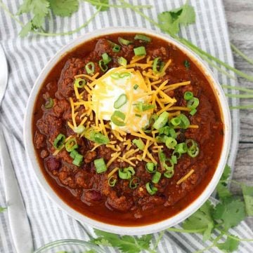 Instant Pot Pumpkin Chili is so easy to make and packed with fall flavors from pumpkin pie spices and apple cider! This recipe uses a whole can of pumpkin and is slightly sweet, slightly spicy, and tastes smooth and velvety.