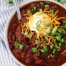 Instant Pot Pumpkin Chili is so easy to make and packed with fall flavors from pumpkin pie spices and apple cider! This recipe uses a whole can of pumpkin and is slightly sweet, slightly spicy, and tastes smooth and velvety.