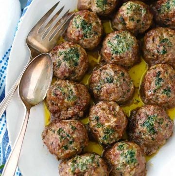 A close up photo of greek meatballs