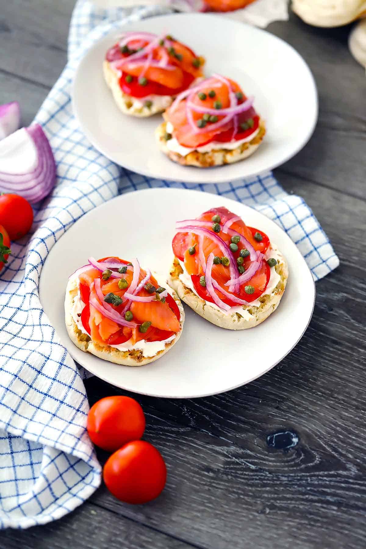 Smoked salmon english muffins on plates