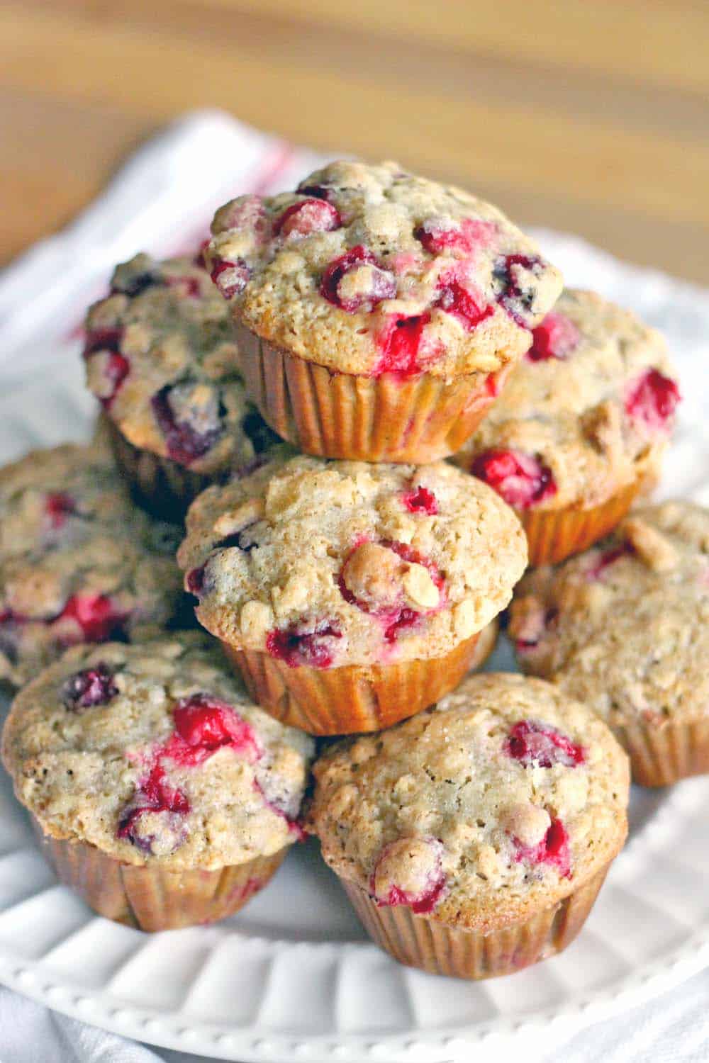 These whole wheat cranberry ginger pecan muffins are healthy, hearty, and oh so tasty! Perfect for Christmas morning, using the leftover fresh cranberries from Thanksgiving you have stored in your freezer!